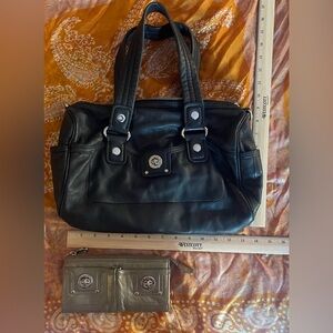 Black leather Marc Jacobs bag with coordinating silver wallet. EUC!!